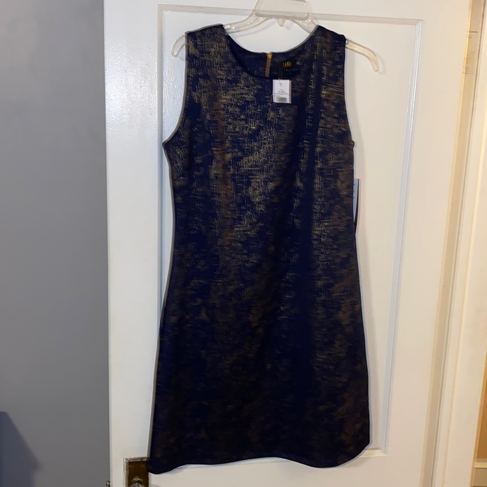 New Navy with gold contemporary dress with no sleeve’s